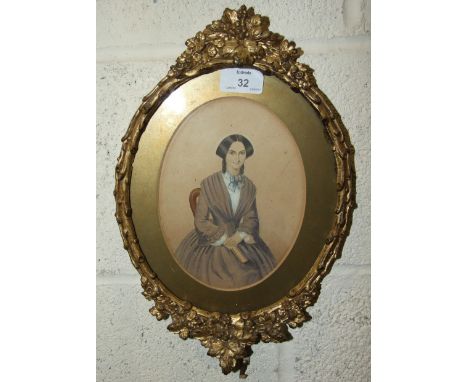 Victorian School portrait miniature of a young woman holding a book, three-quarter length, unsigned watercolour, 18 x 14cm, i