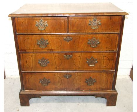 A 17th/18th century inlaid walnut rectangular chest of two short and three long drawers, on bracket feet, 93cm wide, 92cm hig