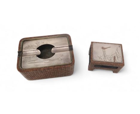 A JAPANESE WHITE METAL AND STRAW MATCHBOX HOLDER&nbsp; Engraved with a bird on a branch,6cm wide and a cigarette box,10.5cm w