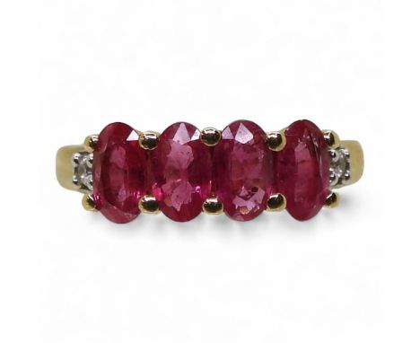 A RUBY &amp; DIAMOND RING set with four Burmese rubies of approx 5mm x 3mm, with white zircon accents, finger size G, weight 