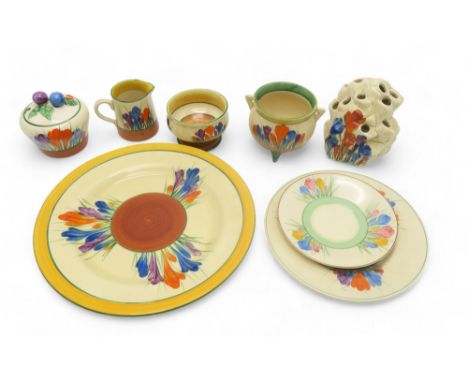 A SMALL COLLECTION OF CLARICE CLIFF BIZARRE CROCUS PATTERN WARES  including a flower brick, a plate 22.5cm diameter, a smalle