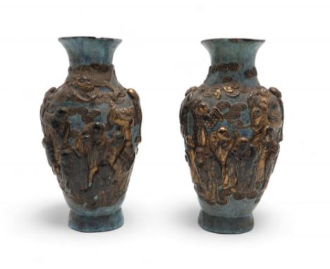 A PAIR OF CHINESE RELIEF MOULDED BALUSTER VASES&nbsp; Decorated in gilt with dragons above immortal figures and amongst cloud