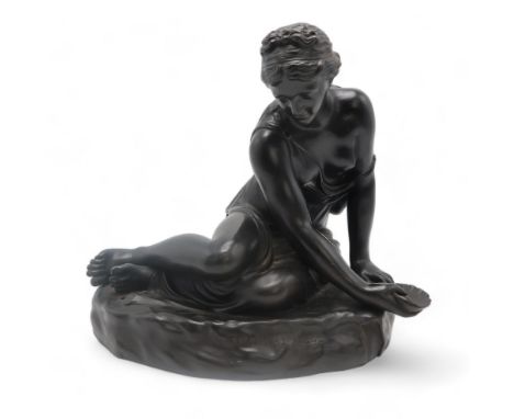 A 19TH CENTURY WEDGWOOD POLISHED BLACK BASALT FIGURE OF NYMPH AT WELL modelled holding a shell in her hand, incised title to 