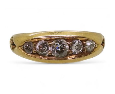 A VINTAGE DIAMOND RING set with five diamonds with the combined estimated approx carat weight of 0.40cts. Finger size L1/2, w