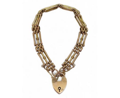 A DECORATIVE GATE BRACELET in 9ct rose gold, with a heart shaped clasp, length 19.5cm, weight 13.3gms&nbsp; Condition Report:
