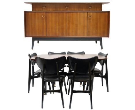 A MID 20TH CENTURY G PLAN E-GOMME LIBRENZA DINING SUITEComprising Tola sideboard with three short drawers over pair of concer