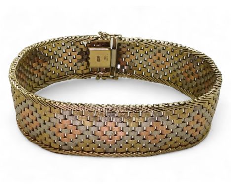 A THREE COLOUR GOLD BRACELET with woven diamond pattern, width 1.8cm, length 20cm, weight 35.2gms Condition Report:There is o