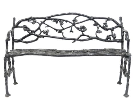 A 19TH CENTURY CAST IRON COALBROOKDALE STYLE GARDEN BENCH&nbsp; with black painted back, seat and sides cast in a tree branch