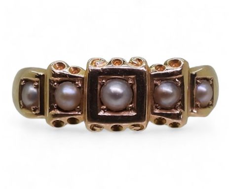 A VINTAGE RING made in 15ct gold and set with five split pearls, finger size P1/2, weight 4.3gms Condition Report:Available u