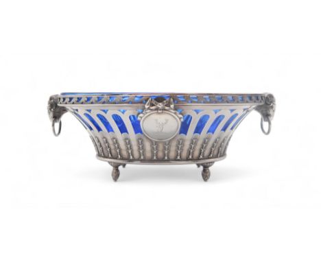 A VICTORIAN SILVER FRUIT BOWL by Robert Garrard, London 1877, of oval form, with embossed floral openwork body, with a ribbon