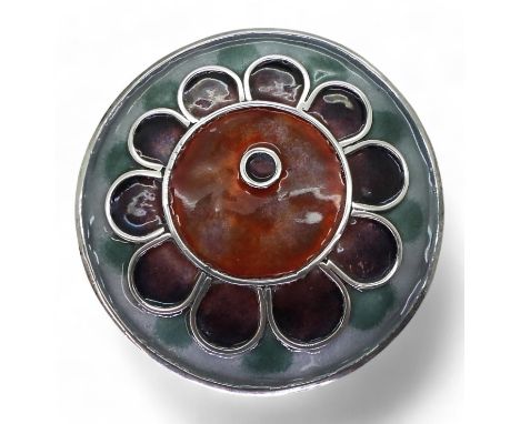 A NORMAN GRANT FLOWER BROOCH enamelled in bright colours, diameter of the brooch 5.7cm. Can also be worn as a pendant with at