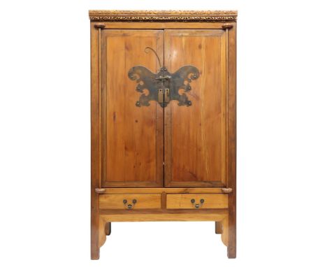 A 20TH CENTURY CHINESE HARDWOOD WEDDING CABINET&nbsp; with carved pierced frieze over pair of cabinet doors decorated with br