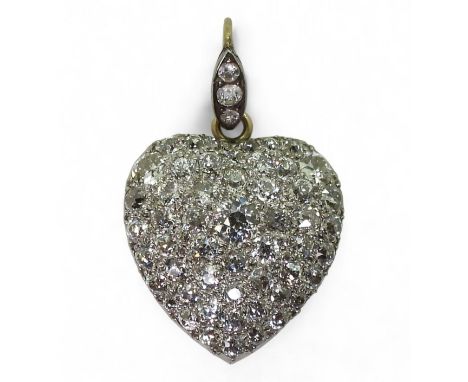 A DIAMOND SET HEART LOCKET craftsman made by Goldsmiths & Silversmiths Company, Regent St, London, in original fitted box. ma