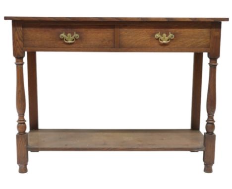 A 19TH CENTURY OAK HEAL & SON, LONDON TWO TIER BUFFET TABLEWith pair of drawers both stamped “HEAL & SON LONDON” with brass d