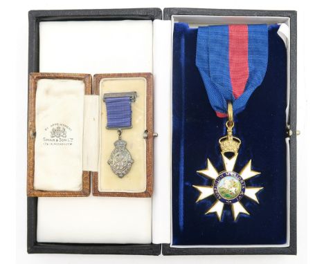 A MOST DISTINGUISHED ORDER OF St. MICHAEL AND St. GEORGE COMPANION'S NECK BADGE In velvet-lined fitted case by Spink, London,