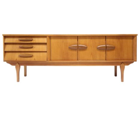 A MID 20TH CENTURY TEAK JENTIQUE SIDEBOARDWith fall front drinks cabinet flanked by cabinet doors alongside three graduating 