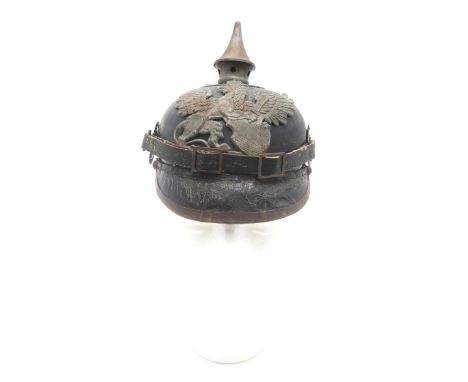 A WW1 IMPERIAL GERMAN GRAND DUCHY OF BADEN OTHER RANKS PICKELHAUBE The rear neck guard ink-stamped "1916 R114"; the grey meta