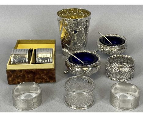 ELEVEN ITEMS OF SMALL SILVER, including pair of embossed circular salts on hoof feet with blue glass liners, London 1893, mak