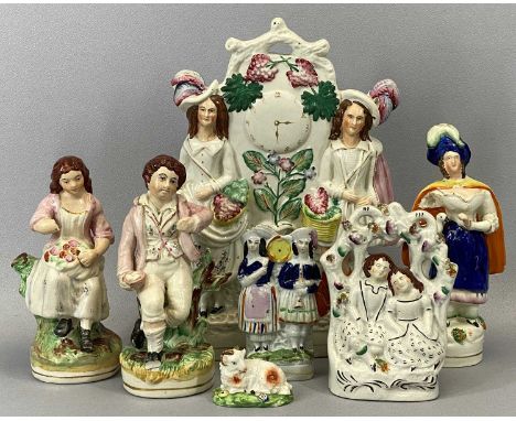 19TH CENTURY STAFFORDSHIRE FLATBACK GROUPS, lady by pillar with bird, 21cms H, clock group, 31cms H, couple beneath arch, 15.