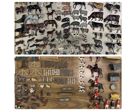 EARLY 20TH CENTURY BRITAINS PAINTED LEAD FIGURES, including a hunting group with mounted hunstmen and women, ten hounds in va