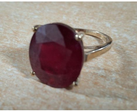 9ct yellow gold ring with large oval cut Ruby,4.7 grams gross         Size J/K