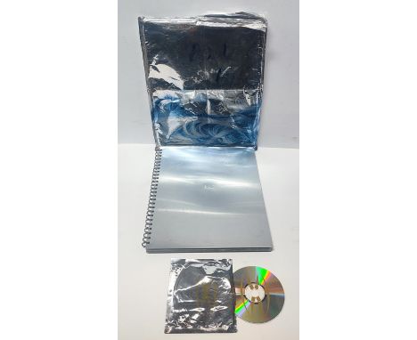 Limited Edition, box set - Madonna "Sex" book (spiral bound, metal front and back with silver mylar bag) and "Erotic" CD sing