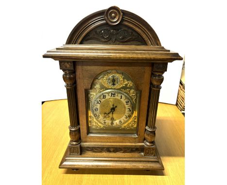 Fine quality, large, late Victorian, hardwood cased mantle clock with domed top with an enamel and ornate brass clock face be