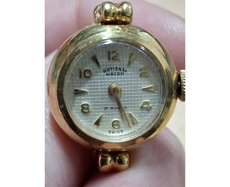 Swiss made 18ct gold finger watch " Natural watch co" with original box from Messina Italy. Weight 12.6g