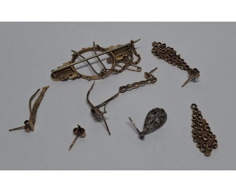 Collection of 9ct gold earrings and single earrings and a 9ct gold coin holding brooch (Qty),Please note - the brooch pin is 
