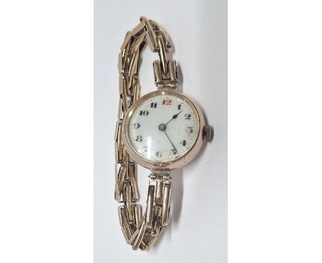 ANTIQUE LADIES 9CT ROSE GOLD ROLEX WRISTWATCH COMPLEATE WITH ORIGINAL 9CT GOLD EXPANDABLE STRAP, circa 1920s.Please note - we