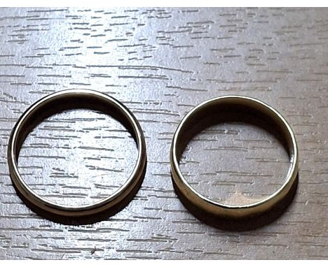 Two yellow gold wedding rings (2) One is 18ct and 3.6g size OThe other is 8ct 2.3g size R