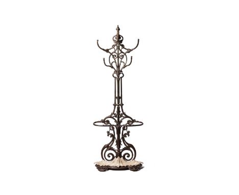 A Victorian Coalbrookdale cast iron hallstand with hat and coat hooks above a stick stand with cast iron leaf form drip tray,