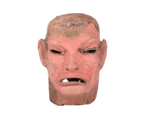 An original over-sized papier mache mask/head, modelled as Frankenstein's monster, used as a stage prop for 'The Canyons of H