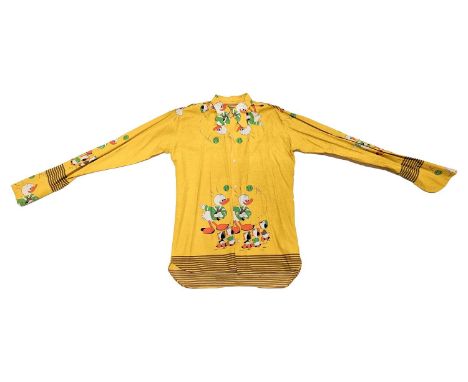 A 1960s beagle-collared yellow shirt, from the collection of Vivian Stanshall, founding member of the Bonzo Dog Doo-Dah Band,