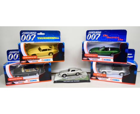 Five James Bond movies model vehicles, four Corgi and one other, boxed