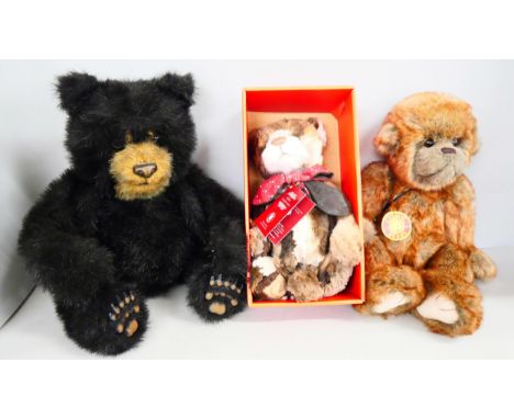 Two Charlie Bears, Damon, boxed, and Dibley, and a 'Tiger' battery operated Teddy bear