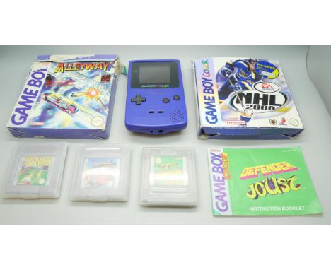 A Game Boy Colour with games including Tennis, Defender Joust and Super RC Pro Am