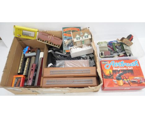 A collection of railway related items, includes 00 gauge track and lone star treble 0 Lectric and rolling stock and a model a