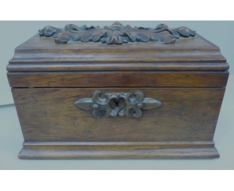 A Victorian rosewood tea caddy, fitted interior complete with caddies. With a later mixing bowl and Georgian silver caddy spo