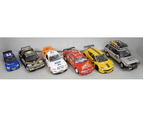 Six Burago model vehicles, Land Rover, Subaru, Lancaster, etc.