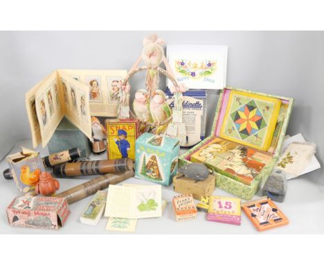 A collection of vintage games/card games including block puzzle, Leghorn Lucy, puzzle tiles, two clockwork mice, Nativity sce