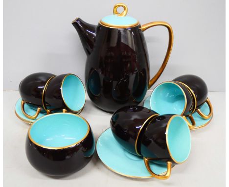 A Carlton Ware black and turquoise coffee set with gilt detail, 6 cups, 5 saucers, sugar and coffee pot