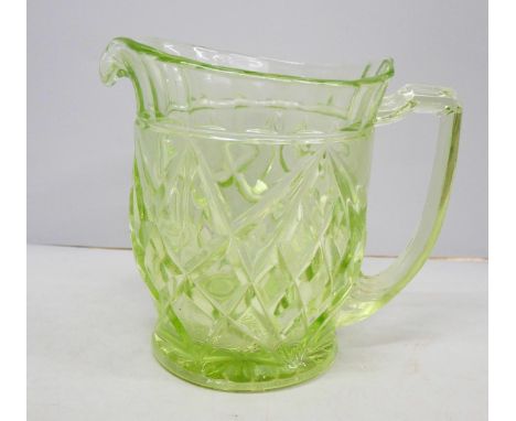 A green uranium glass jug, 16cm