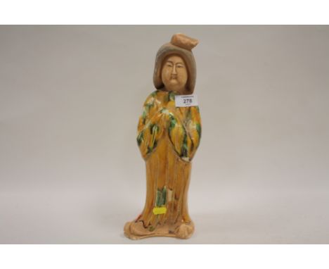 AN ORIENTAL GLAZED CERAMIC FIGURE OF A LADY