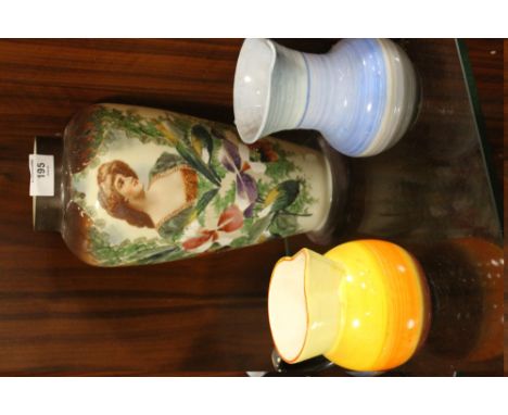 A SHELLEY CERAMIC JUG, TOGETHER WITH A CROWN DEVON EXAMPLE AND A PAINTED GLASS VASE (3) 