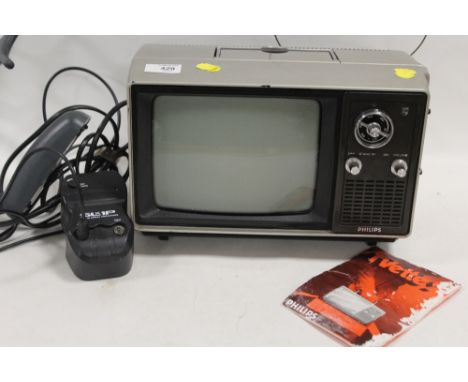 A VINTAGE PHILIPS TV ETTE WITH AERIAL &amp; MANUAL