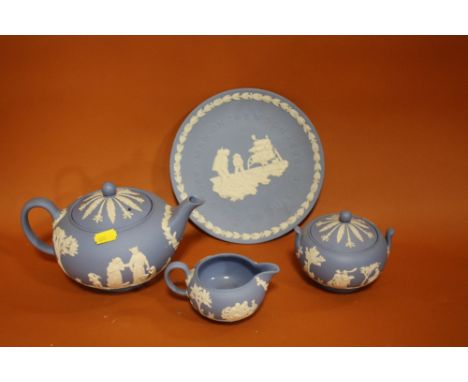 A WEDGWOOD JASPERWARE THREE PIECE TEA SERVICE, TOGETHER WITH A 'MAN ON THE MOON' CABINET PLATE (4)  