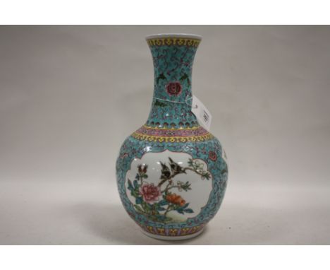 A LARGE CHINESE CERAMIC BOTTLE VASE DECORATED WITH BIRDS ON A BRANCH HEIGHT - 34CM 