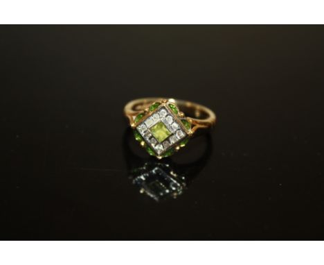 A 10CT GOLD PERIDOT SET DRESS RING SIZE L, APPROX 4g