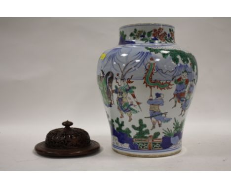 A LARGE CHINESE CERAMIC BALUSTER VASE DECORATED WITH A CLASSICAL SCENE WITH FIGURES HAVING MATCHED PIERCED WOODEN COVER HEIGH